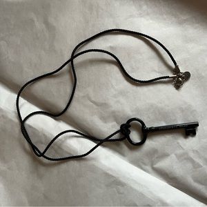 Preloved Tiffany & Co Black Bone Oval Key Pendant Necklace with Cord